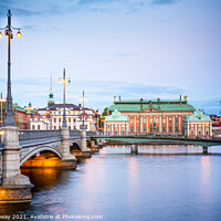 Buy canvas prints of View From A Bridge To Gamla Stan At Night by Peter Greenway
