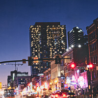 Buy canvas prints of Jumping Downtown Nashville, Tennessee On A Saturday Night by Peter Greenway