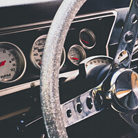 Buy canvas prints of Classic American Car Steering Wheel & Dashboard by Peter Greenway