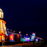 Buy canvas prints of Illuminated Helter Skelter At The Hunstanton Seafront Funfair by Peter Greenway