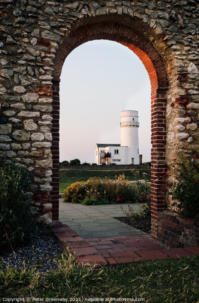 The Lighthouse In Old Hunstanton At Sunset Through The Archway Of Picture Board by Peter Greenway