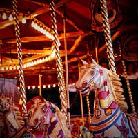 Buy canvas prints of Children's Vintage Fairground Carousel Ride by Peter Greenway