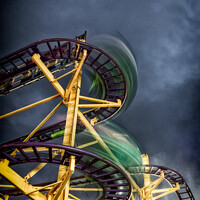 Buy canvas prints of Mini Roller Coaster Ride At The Annual 'Witney Feast' Travelling Funfair In Oxfordshire by Peter Greenway