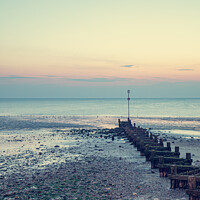 Buy canvas prints of Reflected Light Over Hunstanton Beach At Sunset by Peter Greenway