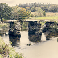 Buy canvas prints of The Ancient 'Clapper Bridge' At Packbridge, Dartmoor, Devon by Peter Greenway
