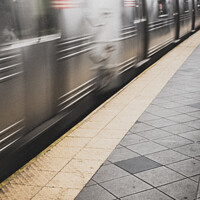 Buy canvas prints of Moving New York City Subway Train by Peter Greenway