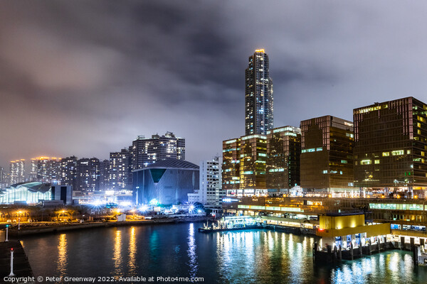 Hong Kong Skyline at Kowloon Harbour at Night Picture Board by Peter Greenway
