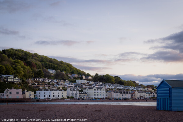 Beach Huts On Teignmouth's 'Back Beach' At Dusk Picture Board by Peter Greenway