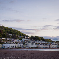 Buy canvas prints of Beach Huts On Teignmouth's 'Back Beach' At Dusk by Peter Greenway