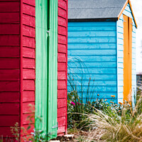 Buy canvas prints of Brightly Coloured Wooden Allotment Sheds by Peter Greenway