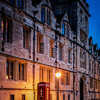 Buy canvas prints of Illuminated Iconic Red British Telephone Box In Oxford City Centre by Peter Greenway