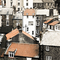 Buy canvas prints of Colourful Rooftops Of Staithes Fishing Port by Peter Greenway