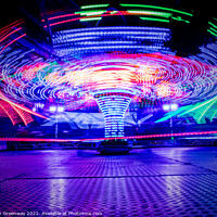 Buy canvas prints of Light Trails From The Twisters Fairground Ride At The Woodstock  by Peter Greenway