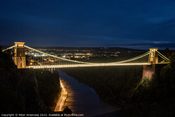 Traffic Light Trails Under The Clifton Suspension Bridge, Avon A Picture Board by Peter Greenway