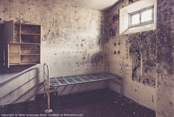 Metal Bedframe & Cupboard Storage In An Inmates Prison Cell In A Picture Board by Peter Greenway