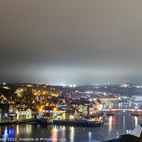 Buy canvas prints of Whitby Harbour Illuminated At Night by Peter Greenway