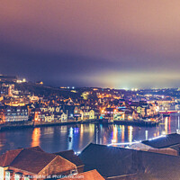 Buy canvas prints of Whitby Harbour Illuminated At Night by Peter Greenway