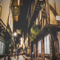 Buy canvas prints of Side Street Around 'The Shambles' In York At Night by Peter Greenway