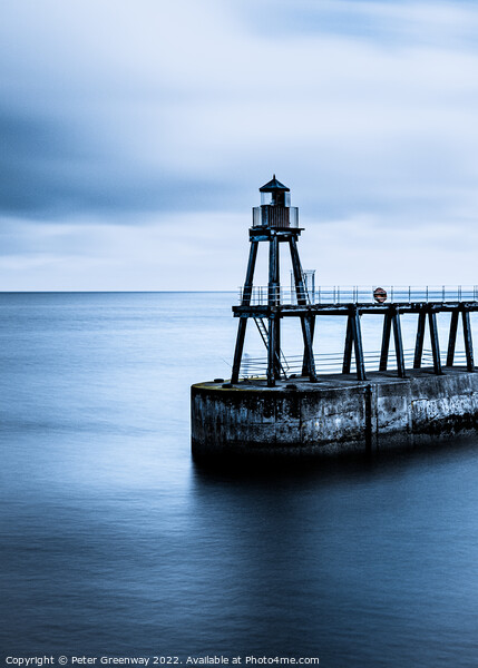 The Red Shipping Lighthouse On The East Pier At Whitby On A Cold Picture Board by Peter Greenway