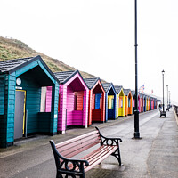 Buy canvas prints of Colourful Wooden Beach Huts At Saltburn-by-the-Sea On The North  by Peter Greenway
