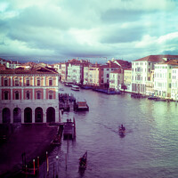 Buy canvas prints of View Of Town Houses Along The Grand Canal In Venice by Peter Greenway