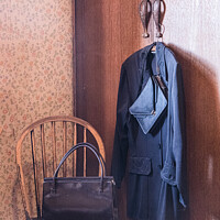 Buy canvas prints of Vintage 1950s' Clothes Hung Up On A Hanger On A Wardrobe by Peter Greenway