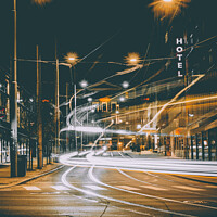 Buy canvas prints of Tram & Traffic Light Trails Through Oslo City Centre by Peter Greenway