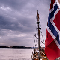 Buy canvas prints of Schooner Fishing Sail Boat & The Norwegian Flag In Oslo Harbour by Peter Greenway