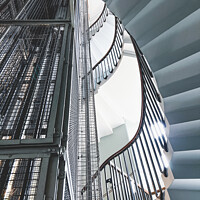 Buy canvas prints of Vintage Caged Lift Shaft & Spiral Staircase In An  by Peter Greenway