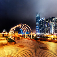 Buy canvas prints of Illuminated Arches & Skyline Around Kowloon Harbour, Hong Kong by Peter Greenway