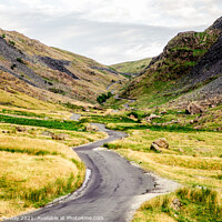 Buy canvas prints of The Winding Road Through The Honiston Pass In The Lake District by Peter Greenway
