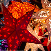 Buy canvas prints of Stars At A German Christmas Market by Peter Greenway