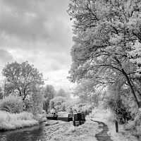 Buy canvas prints of Boats Moored On The Oxford Canal At Lower Heyford  by Peter Greenway