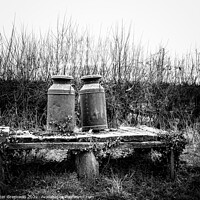 Buy canvas prints of Rusted Vintage Milk Churns On A Wooden Platform by Peter Greenway