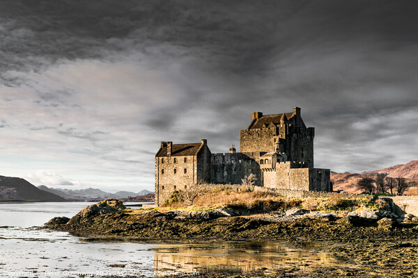 Winters Day At Eilean Donan Castle In The Scottish Highlands Picture Board by Peter Greenway