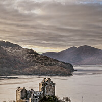 Buy canvas prints of Eilean Donan Castle in the Scottish Highlands From The Hills by Peter Greenway