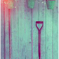 Buy canvas prints of Three Hanging Green Pots Of Daisies, A Spade & A Broom  by Peter Greenway