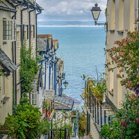 Buy canvas prints of Charming Coastal Village by Martin Yiannoullou