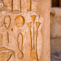 Buy canvas prints of Egyptian hieroglyphs at the Mortuary Temple of Hatshepsut in Luxor, Egypt by Mirko Kuzmanovic