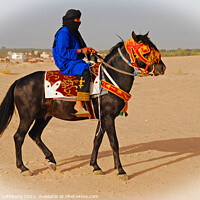 Buy canvas prints of Tunisian Horse Rider by Graham Lathbury