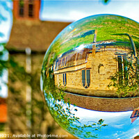 Buy canvas prints of Cotswolds Church through a lensball by Graham Lathbury