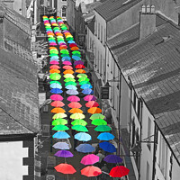 Buy canvas prints of Caernarfon Umbrellas by Graham Lathbury