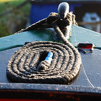 Buy canvas prints of Canal narrowboat bow rope. by Graham Lathbury