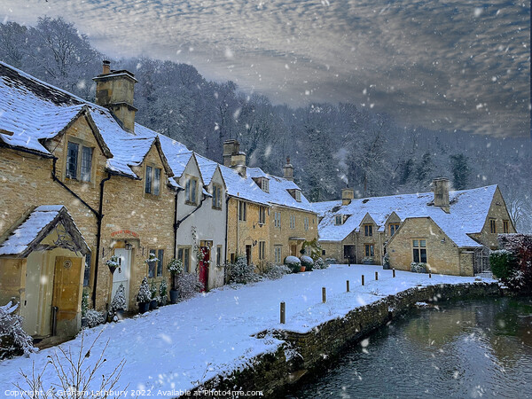 Castle Combe in the snow Picture Board by Graham Lathbury