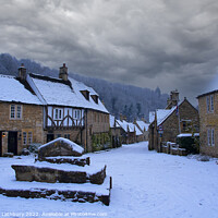 Buy canvas prints of Castle Combe, Cotswolds, in the snow by Graham Lathbury