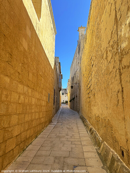 Mdina, Malta,  Side Street Picture Board by Graham Lathbury