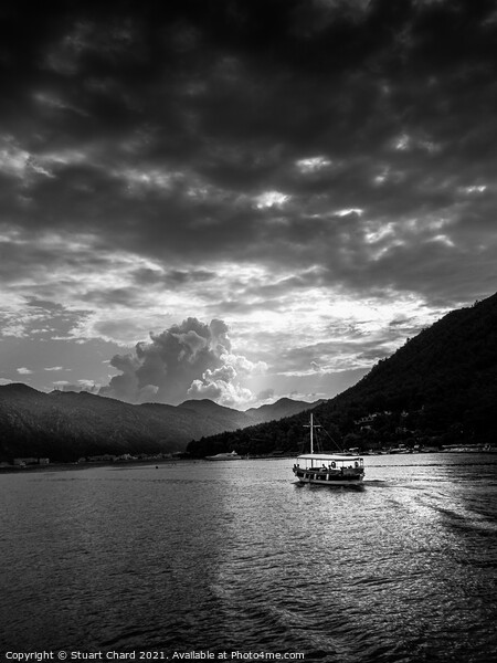 Boat and mountains at sunset - black and white Picture Board by Travel and Pixels 