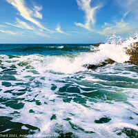 Buy canvas prints of Waves crashing over the rocks with surf and spray by Stuart Chard