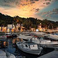 Buy canvas prints of Fishing and sailing boats in the marina at sunset by Stuart Chard