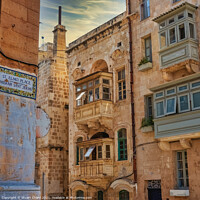 Buy canvas prints of Maltese street and balcony by Stuart Chard
